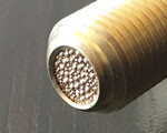 焼結金属の接合例(カシメ) 特殊形状サイレンサー